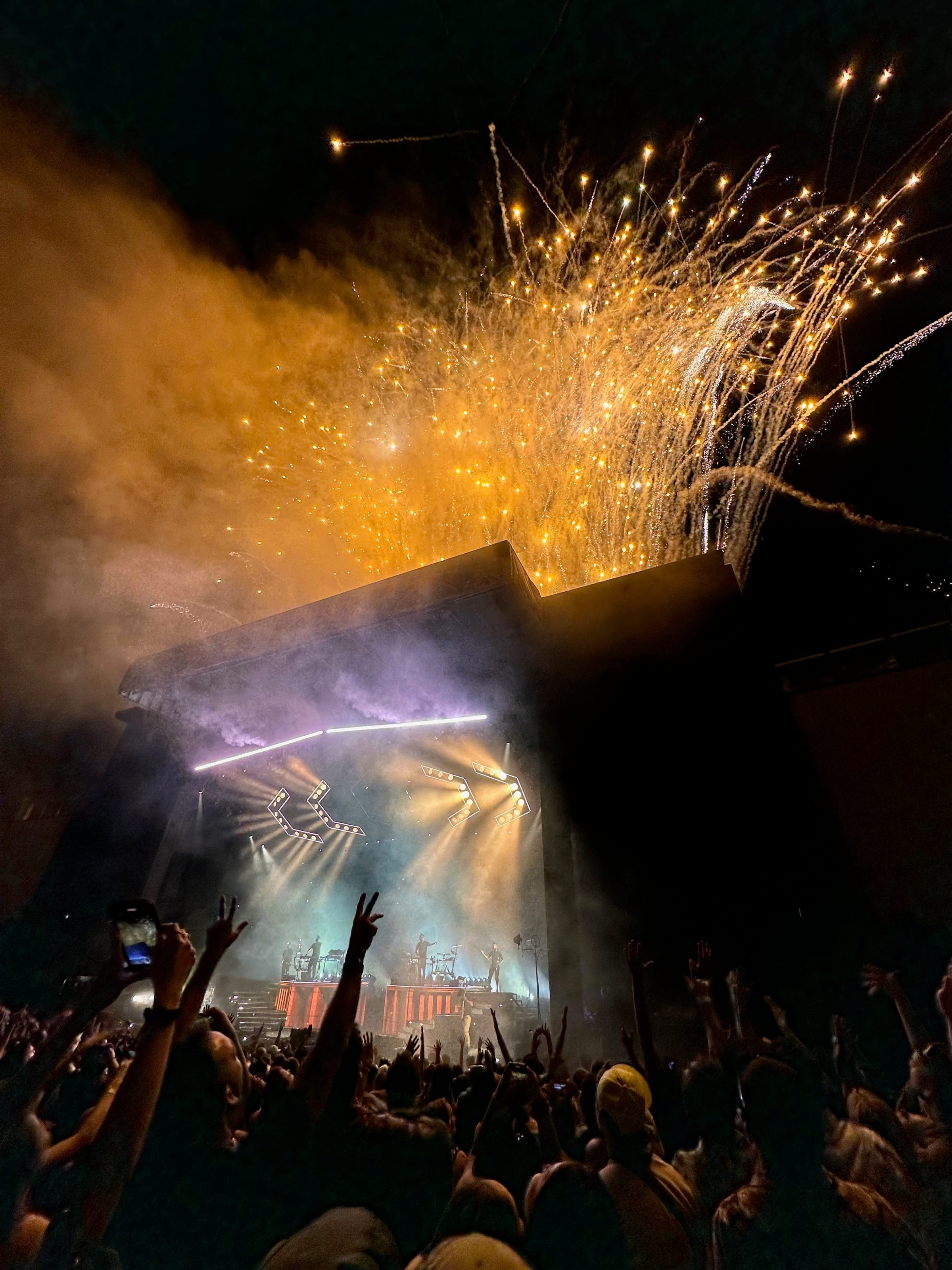 Concert stage with pyrotechnics and crowd